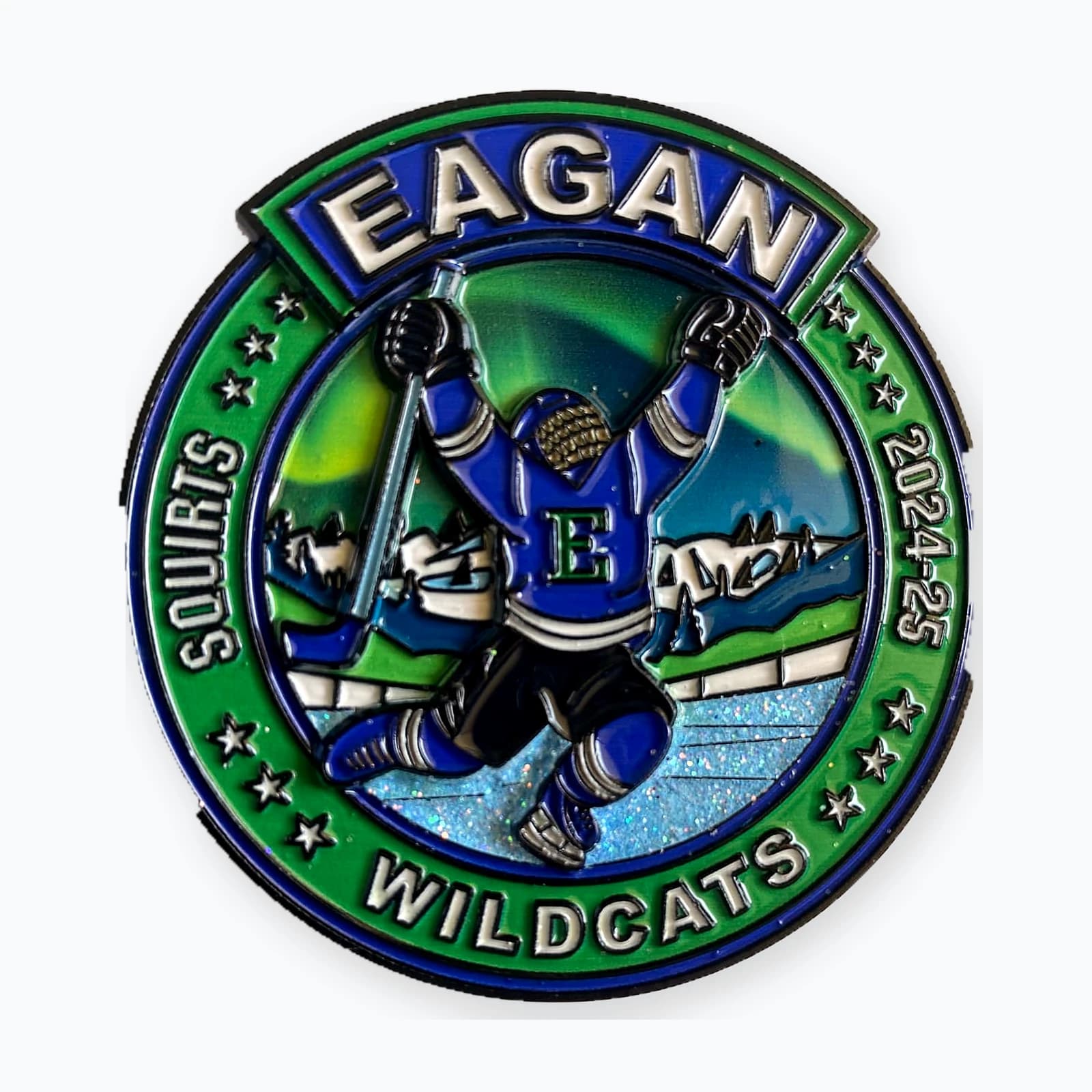 A round Eagan Wildcats squirt trading pin
