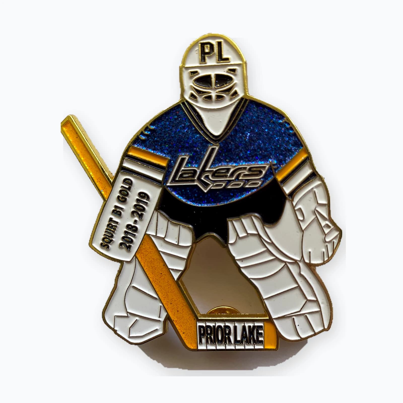 A Prior Lake Lakers trading pin shaped like a goaltender