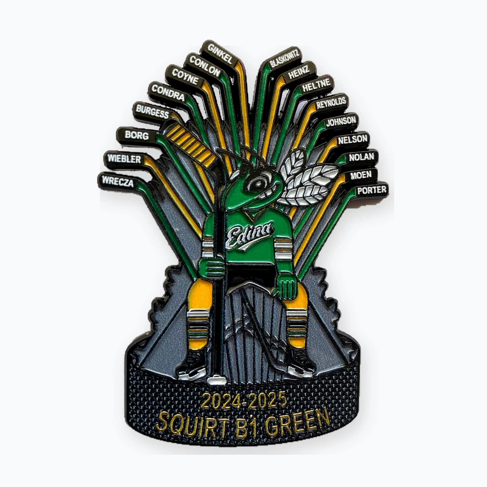 A trading pin showing a glove gripping a fan of hockey sticks