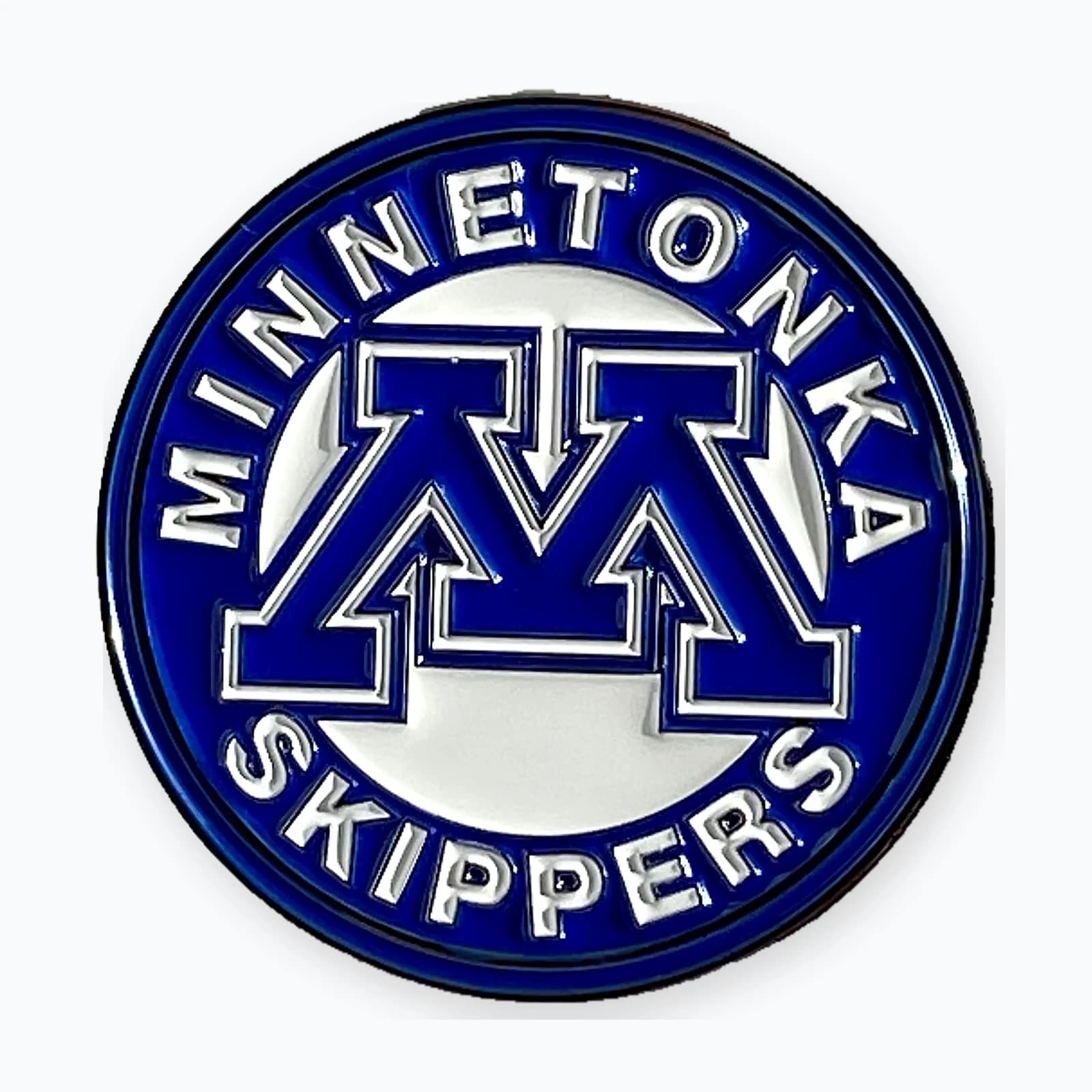 A round blue and white Minnetonka Skippers trading pin