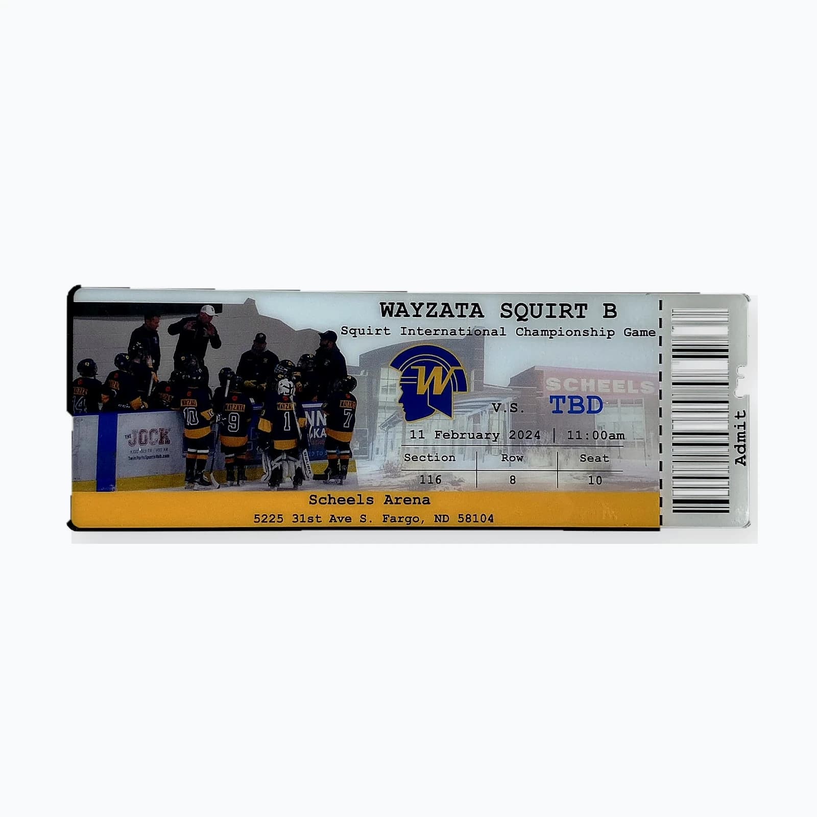 A trading pin shaped like a printed event ticket with the team details on it